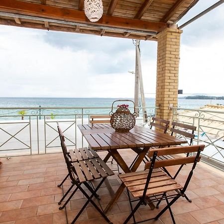 Seaview Stone Apartment In Ipsos Beach Buitenkant foto