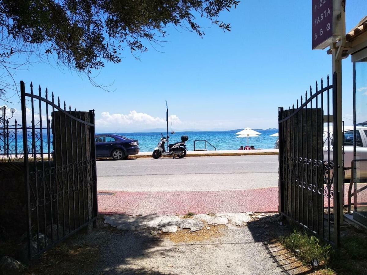 Seaview Stone Apartment In Ipsos Beach Buitenkant foto