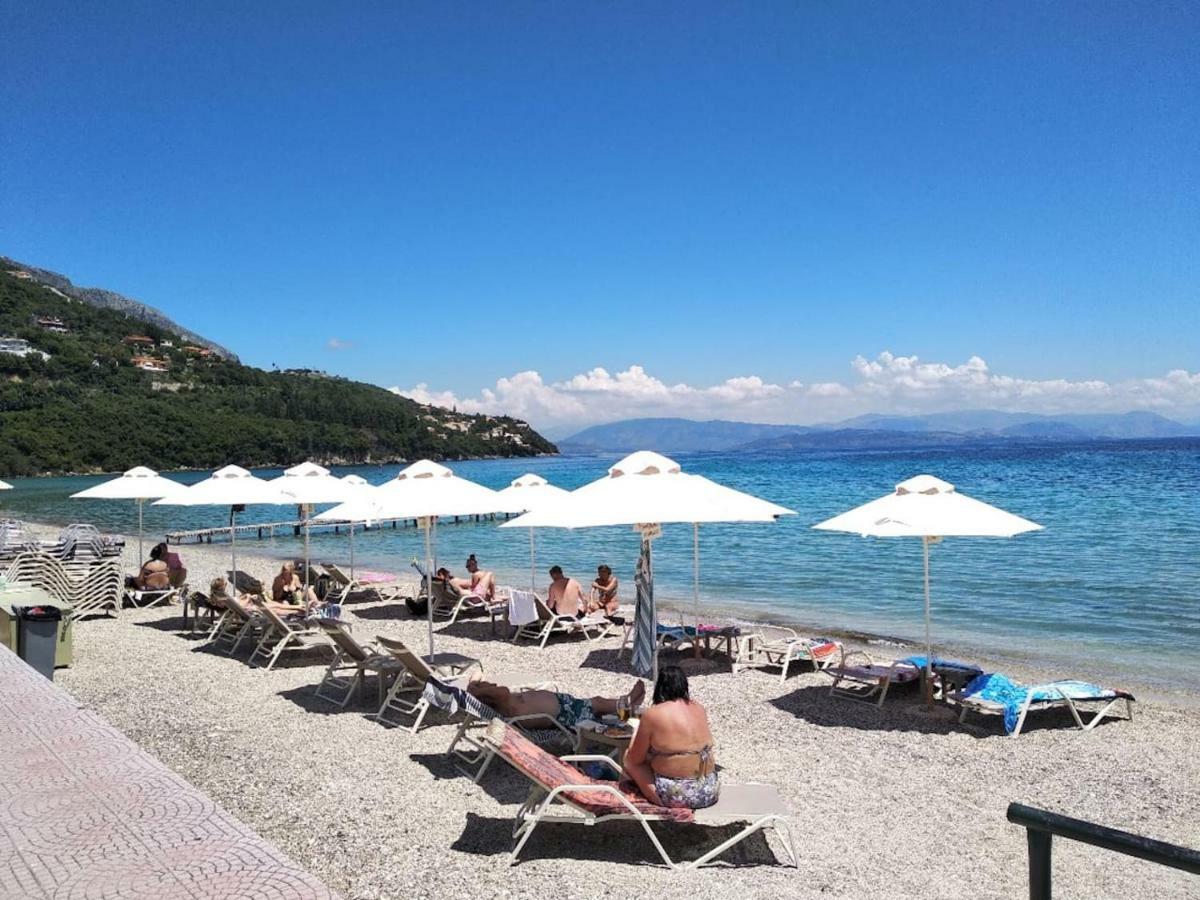 Seaview Stone Apartment In Ipsos Beach Buitenkant foto